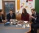 Le prince William et son épouse Catherine avec le prince Frederik et la princesse Mary de Danemark lors d'un briefing au centre d'approvisionnement de l'UNICEF à Copenhague, le 2 novembre 2011.
