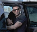 Usher embarque à bord de sa voiture à Miami, le 6 novembre 2011.