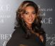 La chanteuse Beyoncé dévoile un ventre arrondi à New York, pour la première du dvd Live At Roseland. Le 20 novembre 2011.