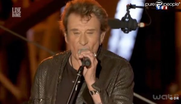 Johnny Hallyday donne un concert privé à la Tour Eiffel pour Live@Home, le samedi 3 décembre 2011.