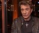 Johnny Hallyday en interview à la Tour Eiffel, le samedi 3 décembre 2011.