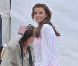 Coleen Rooney, réchauffée le 16 janvier 2012 sur une plage de Miami lors d'un shooting pour la marque Littlewoods