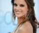 Alessandra Ambrosio : Photo souvenir sur la plage avec son ventre bien rond