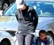 Sandra Bullock, tout sourire, et son petit Louis, à la sortie de l'école, le 16 février 2012 à Los Angeles