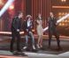 Les quatre coachs de The Voice, Jenifer, Garou, Florent Pagny et Louis Bertignac chantent Rolling in the Deep dans The Voice, samedi 25 février sur TF1