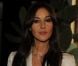 Monica Bellucci, superbe dans un ensemble blazer-jupe crème, assistait au défilé Dolce &amp; Gabbana à Milan, le 26 février 2012.