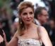 Clotilde Courau en Giambattista Valli lors du 65ème Festival de Cannes pour la montée des marches en l'honneur du film De rouille et d'os le 17 mai 2012
