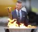 David Beckham s'enflamme, très fier, et le relais olympique s'élance...