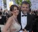 Stéphane Guillon et sa femme Muriel Cousin, tout souriants au Palais des Festivals avant d'assister à la projection du film Lawless. Cannes, le 19 mai 2012.