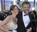 Stéphane Guillon et sa femme Muriel Cousin, tout souriants au Palais des Festivals avant d'assister à la projection du film Lawless. Cannes, le 19 mai 2012.