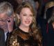 Kylie Minogue portant une robe Dolce &amp; Gabbana lors de la montée des marches pour le film Holy Motors au Festival de Cannes le 23 mai 2012
