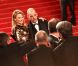 Kylie Minogue et Denis Lavant lors de la montée des marches pour le film Holy Motors au Festival de Cannes le 23 mai 2012