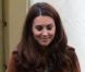 Kate Middleton, duchesse de Cambridge, assiste avec son chien Lupo à un match caritatif de polo auquel les princes William et Harry participent, à Westonbirt, le 17 juin 2012