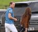 Kate Middleton, duchesse de Cambridge, assiste avec son chien Lupo à un match caritatif de polo auquel les princes William et Harry participent, à Westonbirt, le 17 juin 2012. Kate félicite son mari le prince William