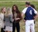 Kate Middleton, duchesse de Cambridge, assiste avec son chien Lupo à un match caritatif de polo auquel les princes William et Harry participent, à Westonbirt, le 17 juin 2012. Kate félicite son mari le prince William