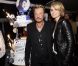 Photos exclusives, reproduction interdite : Johnny Hallyday a fêté ses 69 ans au Stade de France le 15 juin et donné 3 concerts les 15,16 et 17 Juin. Johnny et Laeticia posent devant le gâteau d'anniversaire.
