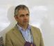 Rowan Atkinson dans le paddock du grand prix de Formule 1 de Grande Bretagne à Silverstone le 8 juillet 2012