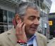 Rowan Atkinson dans le paddock du Grand Prix de Formule 1 de Grande Bretagne à Silverstone le 8 juillet 2012