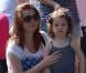 Alyson Hannigan et sa fille Satyana à Los Angeles, le 4 juillet 2012.