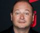 Cauet lors de la conférence de rentrée de NRJ 12, à Paris, le 12 juillet 2012