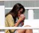 Alessandra Ambrosio et son fils Noah sur une plage de Malibu, le 20 juillet 2012.