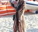 Paris Hilton se promène sur la plage de Pampelonne, à St-Tropez, le samedi 28 juillet 2012.