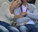 Pause câlin pour le prince Louis de Luxembourg et son épouse la princesse Tessy dans les gradins de l'Aquatics Centre de Londres le 31 juillet 2012.
