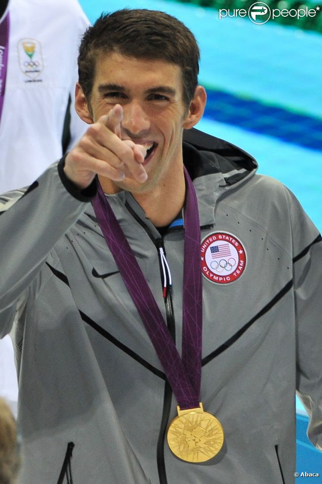 Michael Phelps dédie sa victoire à sa mère Debbie après avoir décroché une 21ème médaille olympique, la 17e en or, en s'imposant lors du 100m papillon le 3 août 2012 lors des JO de Londres