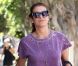 Kate Walsh, stylée en sweater violet, mini-short noir et bottines Chloé à Los Angeles. Le 7 août 2012.