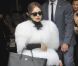  Lady Gaga : sublime en fourrure blanche à la sortie de chez Séphora où elle a présenté son nouveau parfum Fame sur les Champs-Elysées le 23 septembre 2012 