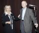 Gilles Jacob, président du Festival de Cannes, remet les insignes d'Officier de l'Ordre des Arts et Lettres a Arlette Gordon, au club 13 à Paris le 23 septembre.