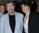 Richard Gotainer et sa femme à la soirée où Arlette Gordon a été décorée, au club 13 à Paris le 23 septembre.