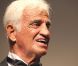 Jean-Paul Belmondo récompensé pour sa carrière à Cannes en mai 2011 devant sa compagne Barbara Gandolfi