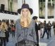 Poppy Delevingne sous sa capeline au défilé Chanel organisé au Grand Palais le 2 octobre 2012