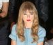 Taylor Swift, attentive à côté de Virginie Ledoyen lors du défilé prêt-à-porter d'Elie Saab à l'Espace Éphémère du jardin des Tuileries. Paris, le 3 octobre 2012.