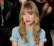 Taylor Swift, ravissante au premier rang du défilé prêt-à-porter printemps-été 2013 d'Elie Saab à l'Espace Éphémère du jardin des Tuileries. Paris, le 3 octobre 2012.