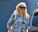 Gwen Stefani, sac Chanel blanc à l'épaule, arrive aux studios d'enregistrement Center Staging à Burbank. Le 8 octobre 2012.
