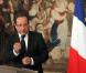 François Hollande rend hommage à Michael Haneke et la productrice Margaret Menegoz à Paris, le 14 octobre 2012.