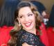 Kelly Brook, craquante dans sa robe noire en dentelle Jacques Azagury, se présente comme nouvelle membre par intérim de la troupe du Crazy Horse. Londres, le 16 octobre 2012.