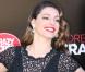 Kelly Brook, habillée d'une robe Jacques Azagury et de souliers Jimmy Choo lors de sa présentation comme nouvelle danseuse du Crazy Horse. Londres, le 16 octobre 2012.