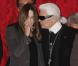 Carla Bruni et Karl Lagerfeld complices à l'Élysée où le président a décoré onze personnalités du monde des arts et du spectacle, le 14 mars 2012.