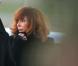 La chanteuse Mylène Farmer et son staff arrivent en jet privé à l'aéroport de Cannes-Mandelieu pour assister aux NRJ Music Awards, le 25 janvier 2013.