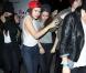 Kristen Stewart escortée par une amie à la sortie de la boîte de nuit Troubadour à West Hollywood, le 5 mars 2013.