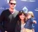 Tiffani Thiessen, son mari Brady Smithet leur fille Harper à la soirée Stuart House Benefit à la boutique John Varvatos à Los Angeles, le 10 mars 2013.