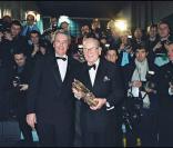 Georges Cravenne et Alain Delon