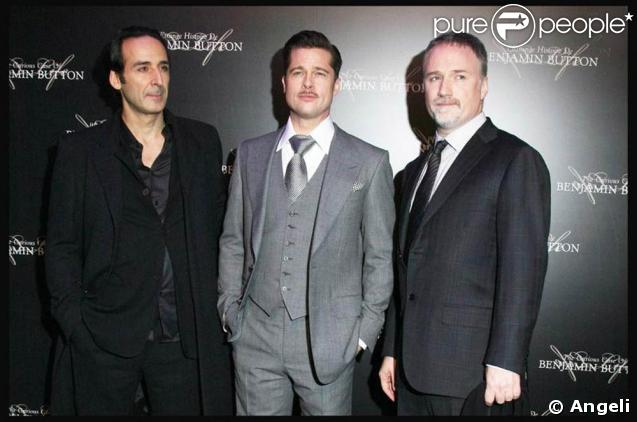 Alexandre Desplat (qui a signé la musique), Brad Pitt et David Fincher 
