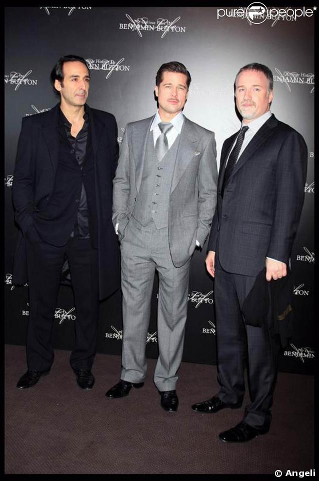 Alexandre Desplat (qui a signé la musique du film), Brad Pitt et David Fincher 