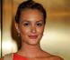 Leighton Meester dévoile sur son visage et ses épaules un beau bronzage simplement réhaussé d'un rouge à lèvres assorti à sa robe. Une vrai déesse au teint hâlé !