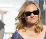 Diane Kruger qui arrive à Cannes avec son sublime sac Tod's, le D-Styling Bauletto... Une merveille !