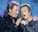 Johnny Hallyday... ses duos au Stade de France avec Sylvie Vartan et David ! Regardez !!!